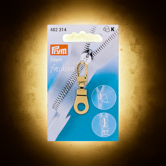 CasaBellissimo Prym Reißverschluss -Zipper-Fashion "Öse" goldfarbig Zipperanhänger auf goldfarbigem Hintergrund