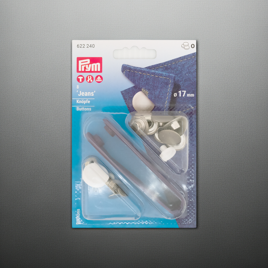 Prym Jeansknöpfe nähfrei, Ø 17 mm in silber und mit Werkzeug in der Blister Verpackung auf silbergrauem Hintergrund