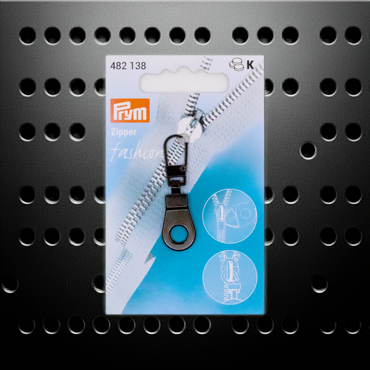 CasaBellissimo Prym Reißverschluß Zipper Fashion Anhänger "Öse" silberfarbig mit schwarzem Lochblech Hintergrund